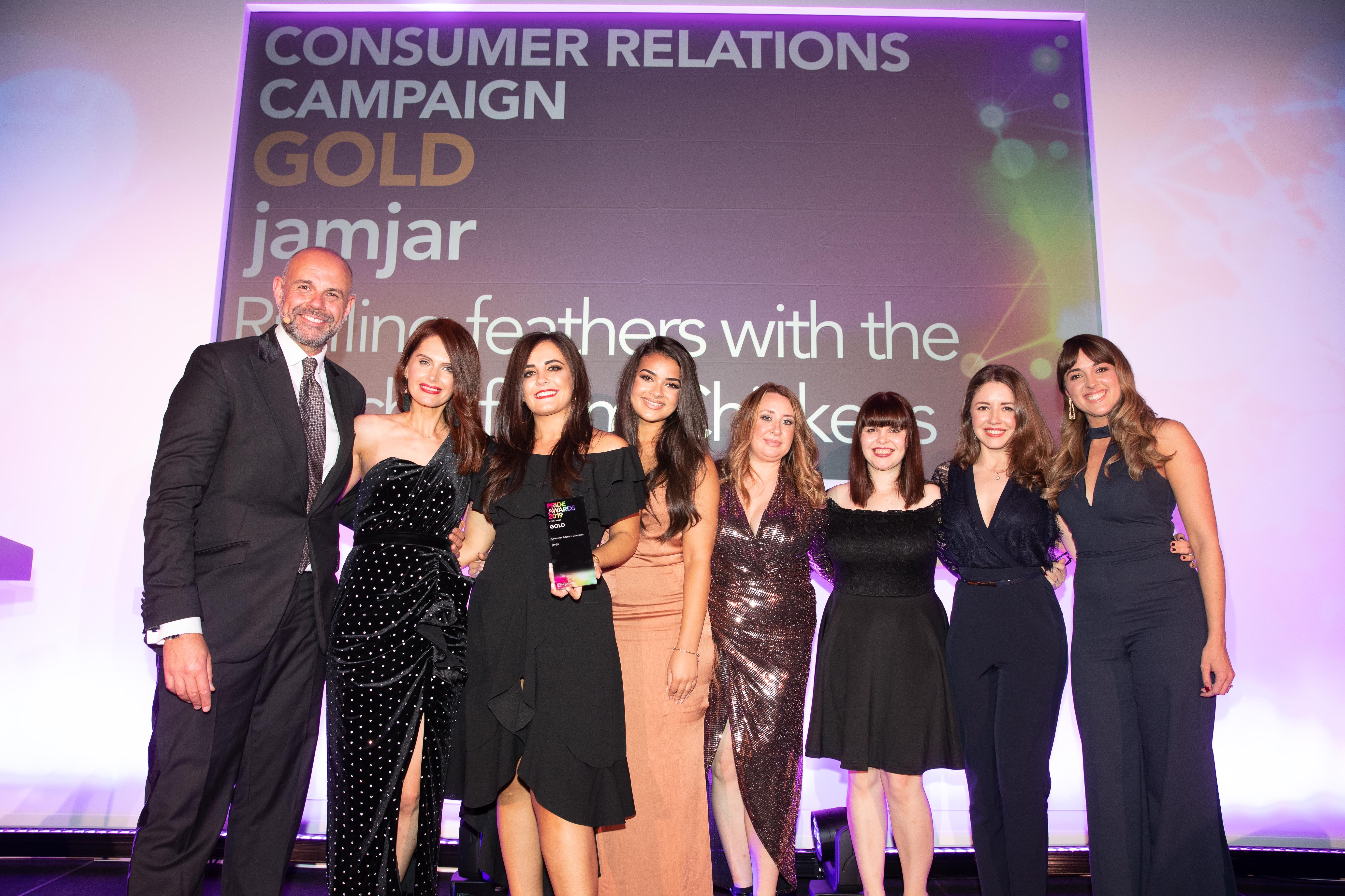 Photograph of the jamjar team with Jason Mohammed at the CIPR PRide Cymru 2019 awards